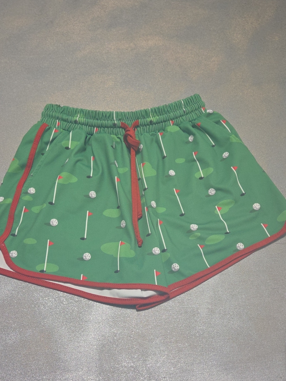 Green Golf-Print Athletic Shorts with Red Trim